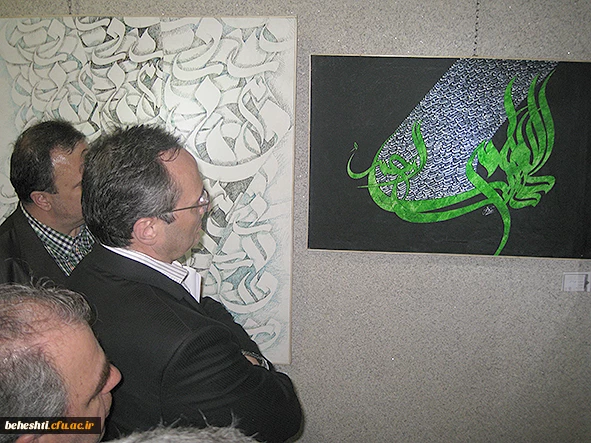 عکس:دکترمهرمحمدی در بازدید از آثار اساتید هنر مرکزآموزش عالی شهید بهشتی تهران 8