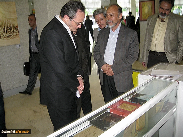 عکس:دکترمهرمحمدی در بازدید از آثار اساتید هنر مرکزآموزش عالی شهید بهشتی تهران 10