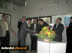 عکس:دکترمهرمحمدی در بازدید از آثار اساتید هنر مرکزآموزش عالی شهید بهشتی تهران 27